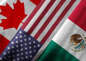 Flags of Canada, the United States and Mexico.  © Can Stock Photo / ronniechua