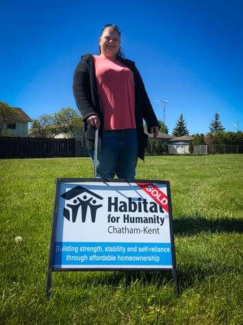 Melanie Dramnitzke with her Habitat for Humanity sold sign in Dresden (Photo courtesy Habitat for Humanity Chatham-Kent)