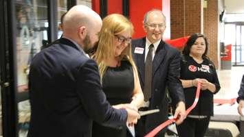 Gerry Vanherk looks on as the ribbon is cut to mark the official grand opening of the new Hart department store at the Downtown Chatham Centre. May 15, 2018. (Photo by Greg Higgins)