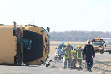 First responders work to clean up the scene of a school bus crash on Merlin Rd. just west of Chatham. March 26, 2018. (Photo by Matt Weverink)