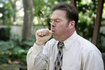 A man coughing. File photo courtesy of © Can Stock Photo / lisafx