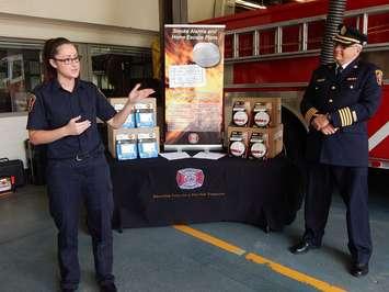 Public educator Ashley Scott and Asst. Fire Chief Bob Davidson introduce awareness campaign May 27, 2015 (Photo by Simon Crouch) 