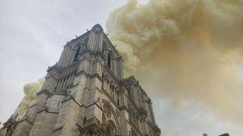 Smoke is seen billowing from Notre Dame de Paris, Paris, France., April 15, 2019. Photo courtesy Anne Hidalgo/Twitter.