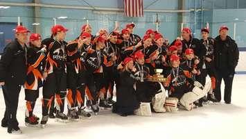 The Kent Teksavvy Cobras Bantam AE team celebrates its OMHA championship win. March 2017. (Submitted photo)