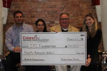 Retro Suites Hotel presents Children's Treatment Centre Foundation with cheque for $20,000. March 19, 2018. (Photo by Sarah Cowan Blackburn News Chatham-Kent). 