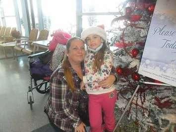 CK Operation Christmas Hospital. Pictured: Organizer Melissa Marie Chauvin with daughter. (Photo courtesy of Melissa Marie Chauvin.) 