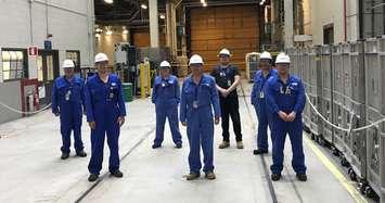 Crew members at the Bruce B generating station stand with the final shipment of Cobalt-60, which has been sent to Ottawa for Nordion to use in processing medical isotope used in the sterilization of medical equipment.  

 
