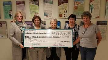 Mary Lou Crowley, Executive Director, Foundation of CKHA and Gaye Thompson,
Chair, Foundation of CKHA Board of Directors, accept a $10,000 donation from Pat
Brett, Millie Bechard and Mari Cole, Sydenham District Hospital Auxiliary. (Photo courtesy of Foundation CKHA)