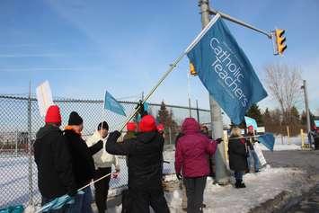 Members of the Ontario English Catholic Teachers Association picket outside of the Ford Engine Plant where Premier Ford was rumoured to be Tuesday, January 21, 2020. (Photo by Maureen Revait)