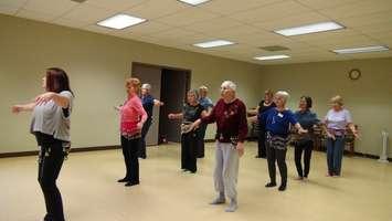 Students take in a belly-dancing class at the Active Living Centre in Chatham.