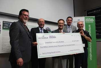 GreenField Specialty Alcohols in Chatham receives a $5-million cheque through the Save on Energy program. Photo taken May 25, 2016. (Photo courtesy Entegrus)