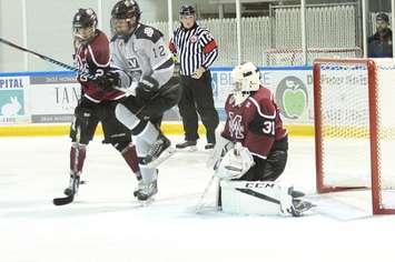 LaSalle Vipers captain Eric Kirby attempts to get out of the way of a shot in front of Chatham Maroons goaltender Ryan Wagner. September 20, 2017.
 (Photo courtesy of Garrett Fodor)