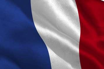 French flag. (Photo courtesy of © Can Stock Photo / 4774344sean). 