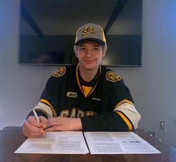 Zach Filak signs with the Sarnia Sting - May 4/20 (Submitted photo)