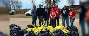 Erieau residents and United Way Chatham-Kent volunteers during a shore cleanup in Erieau on Monday, April 22, 2019. (Photo via United Way CK Twitter) 