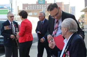 Federal Liberal Party Candidates talk about what their party will do to benefit veterans, outside of Windsor's former veterans affairs office downtown, September 3, 2015. (Photo by Mike Vlasveld)