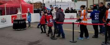 Hundreds lineup for their chance to touch the Stanley Cup in downtown Chatham during Rogers Hometown Hockey event. December 15,2018. (Photo by Cheryl Johnstone)