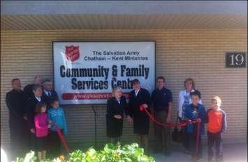 Officials cut the ribbon at the new Salvation Army facility located at 19 Raleigh St., Chatham. September 19, 2014. (Photo by Mike James)