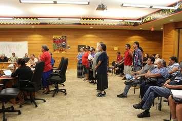Locals stand in front of Walpole Island Band council to express concerns about natural gas construction on Walpole Island. August 10, 2016. (Photo by Natalia Vega)