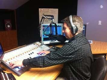 Blackburn Radio's George Brooks in studio on April 9, 2015. (Photo by Mike James.)