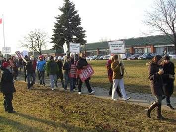 Teachers hold a protest at MPP Dwight Duncan's office on Dec. 18, 2012. 
