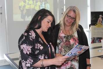 Outreach Wellness Program Coordinator Caress Lee Carpenter (left) sharing information about the new grief and bereavement programs at the Chatham-Kent Hospice's Open House. July 18, 2018. (Photo by Sarah Cowan Blackburn News Chatham-Kent). 